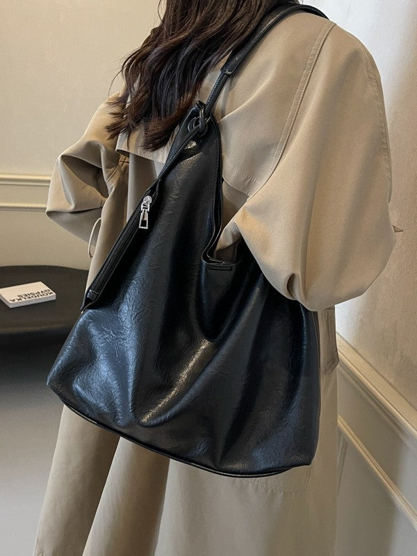 Black Large Hobo Shoulder Bag worn on shoulder