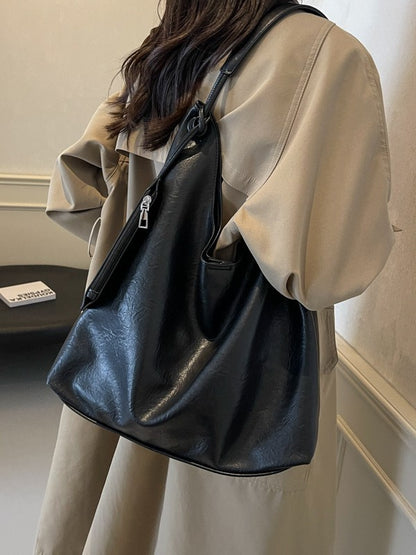 Black Large Hobo Shoulder Bag worn on shoulder