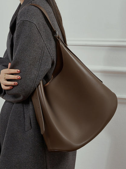 Coffee Genuine Leather Hobo Shoulder Bag worn on shoulder