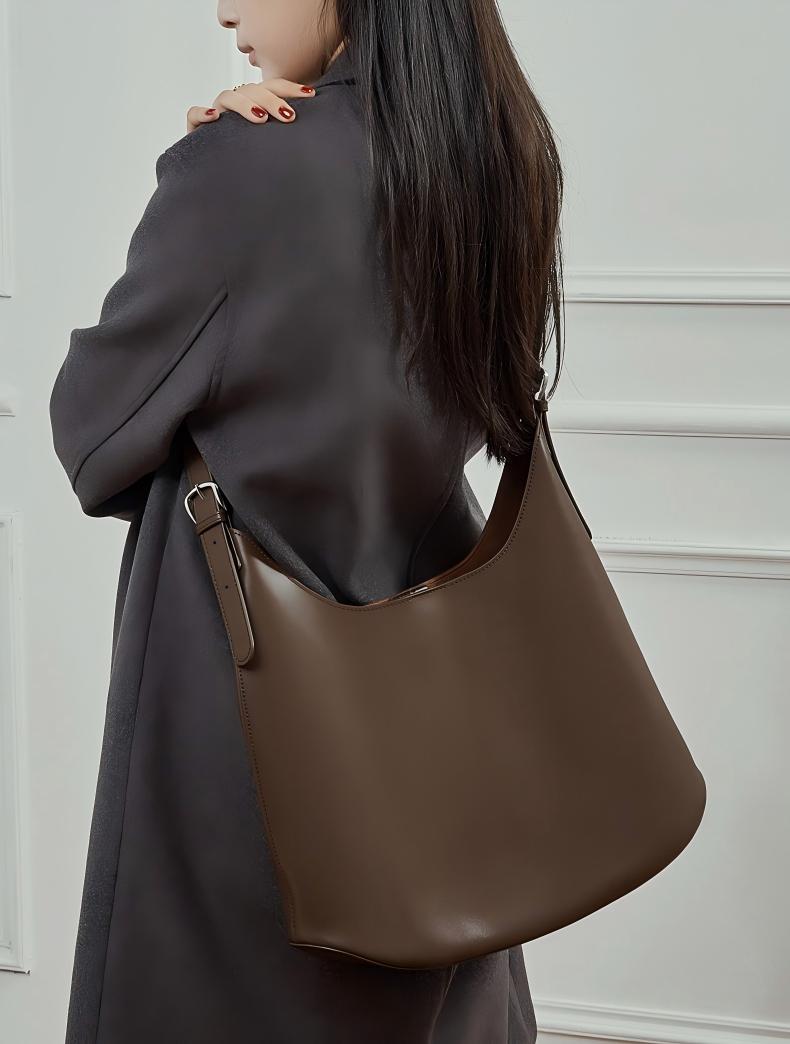Coffee Genuine Leather Hobo Shoulder Bag worn on shoulder