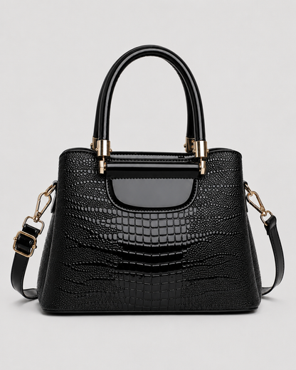Front view of black PORT&LOTUS crocodile embossed PU leather handbag with glossy handles and detachable shoulder strap