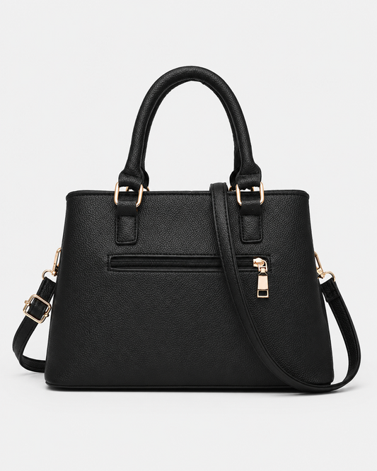 back view of black PORT&LOTUS textured top handle satchel bag rear zipper pocket detachable crossbody strap white background