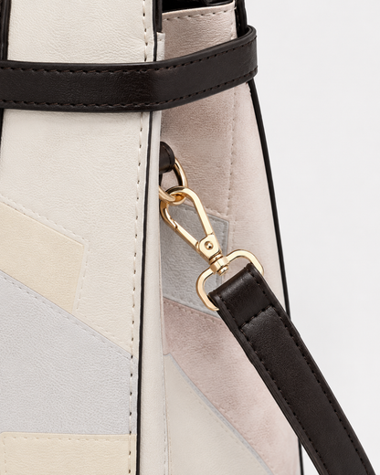 Ivory patchwork vegan leather tote bag with detachable dark brown shoulder strap and gold-tone swivel clasp detail