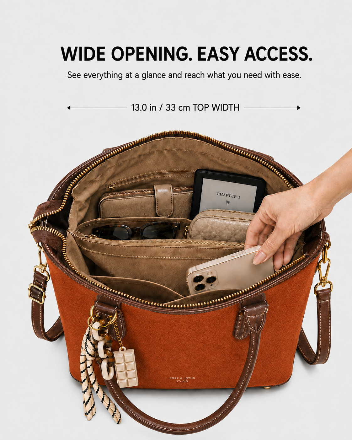 PORT&LOTUS orange tote bag with wide zip opening organized interior compartments phone pocket wallet sunglasses and 13 inch top width